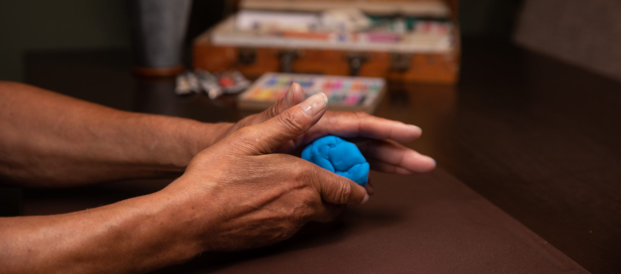 Image of hands molding clay